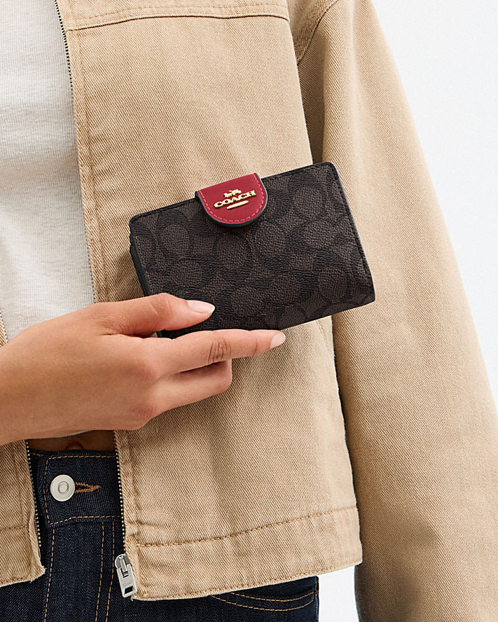 Medium Corner Zip Wallet In Signature Canvas