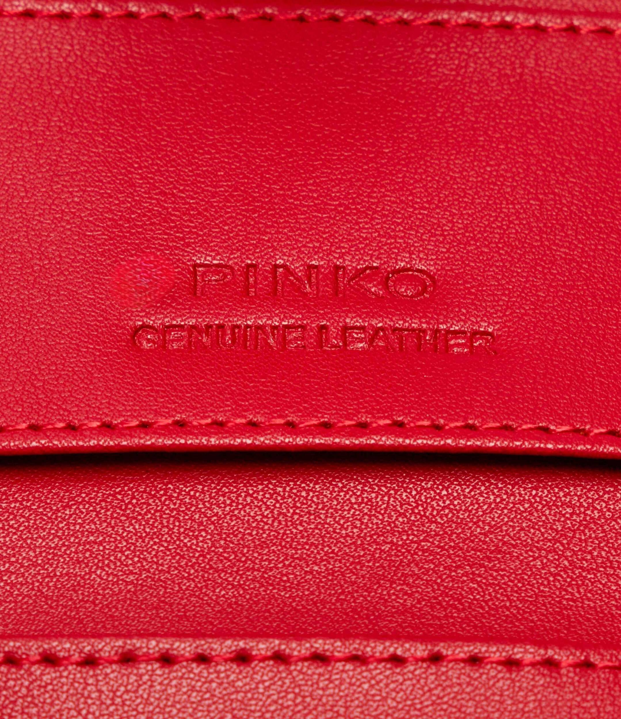 small smooth leather wallet with logo in red