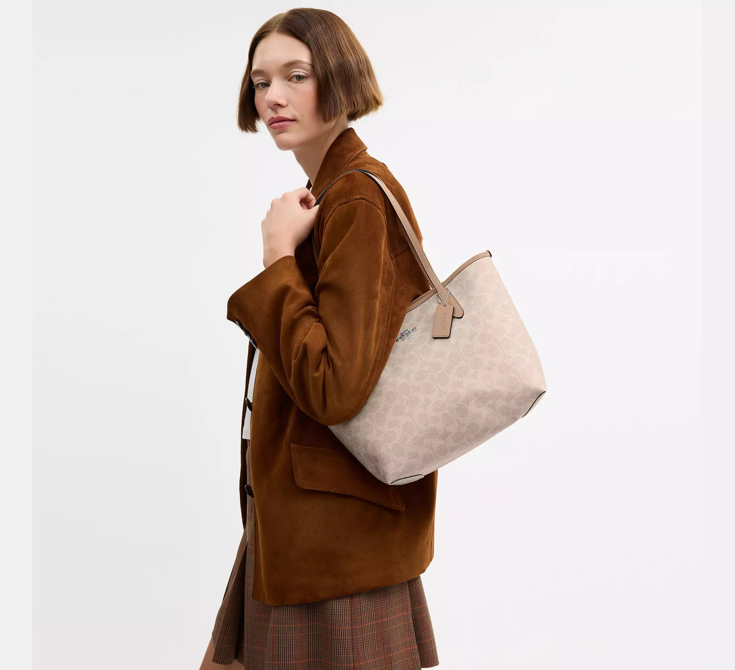 Medium City Tote Bag In Signature Canvas Sand Taupe